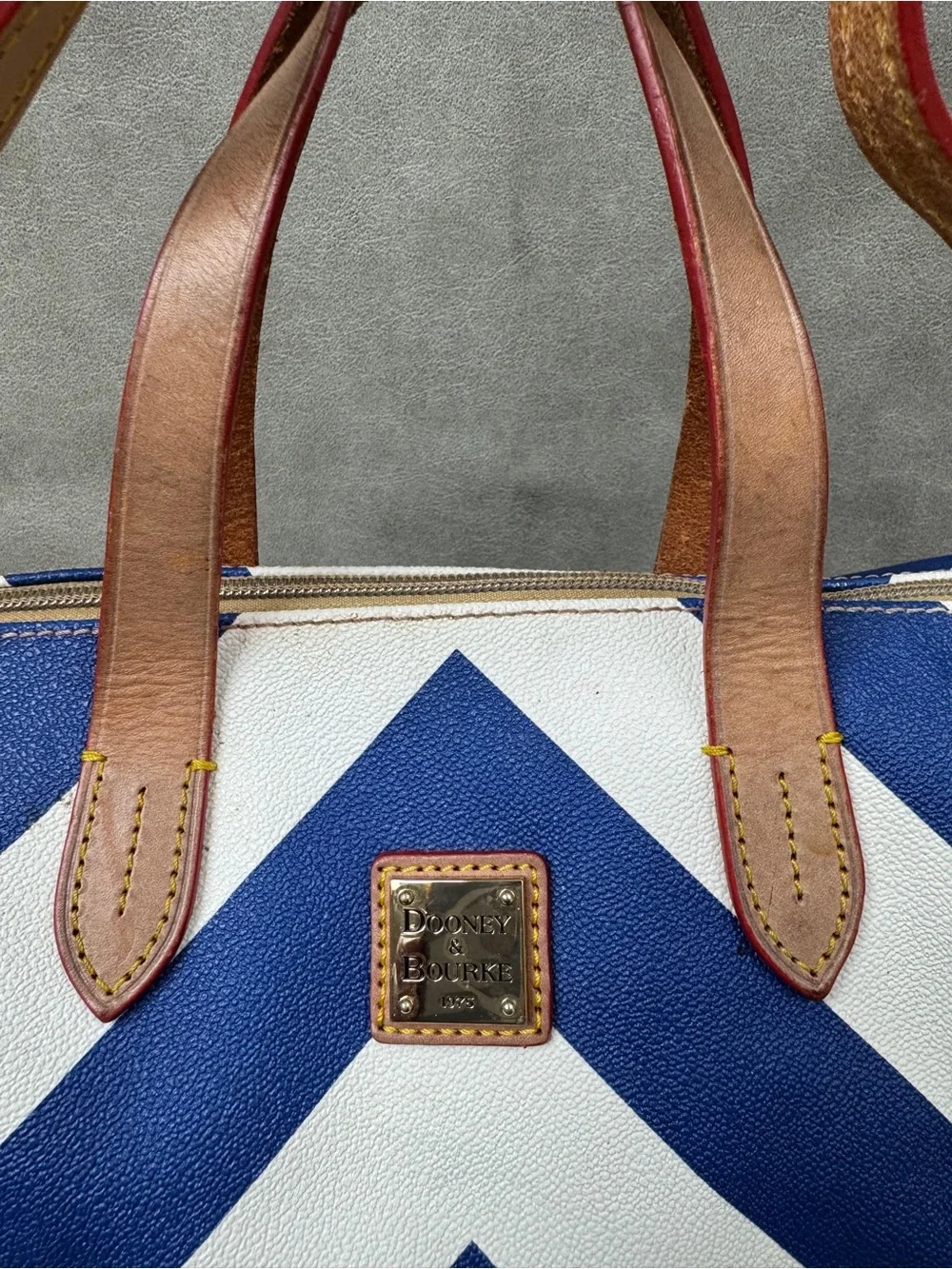 Dooney & Bourke Blue and White Chevron Duffel with Brown Leather Trim